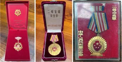 图为王绪旦老人荣获的“光荣在党50年奖章”、“二级金盾奖章”、“二等功奖章”。 云南腾冲出入境边防检查站供图 图为王绪旦老人荣获的“光荣在党50年奖章”、“二级金盾奖章”、“二等功奖章”。 云南腾冲出入境边防检查站供图